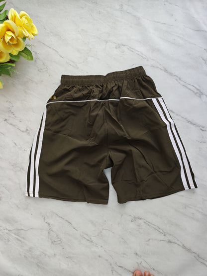 NS 3 line back side piping shorts buy 3 pcs @499 and 1 pcs @199(Green)